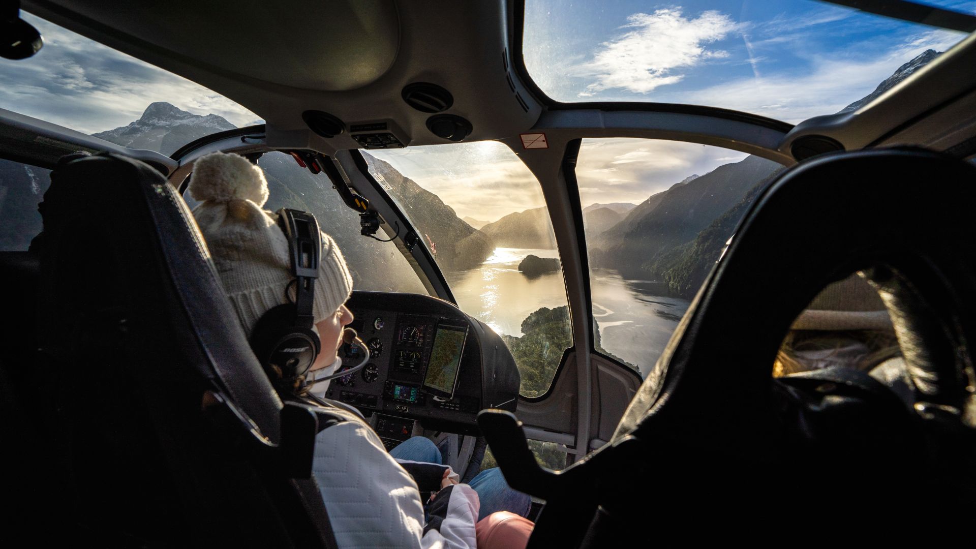 View from the cockpit of a helicopter flying over Fiordland, New Zealand | Over The Top Helicopters, Queenstown